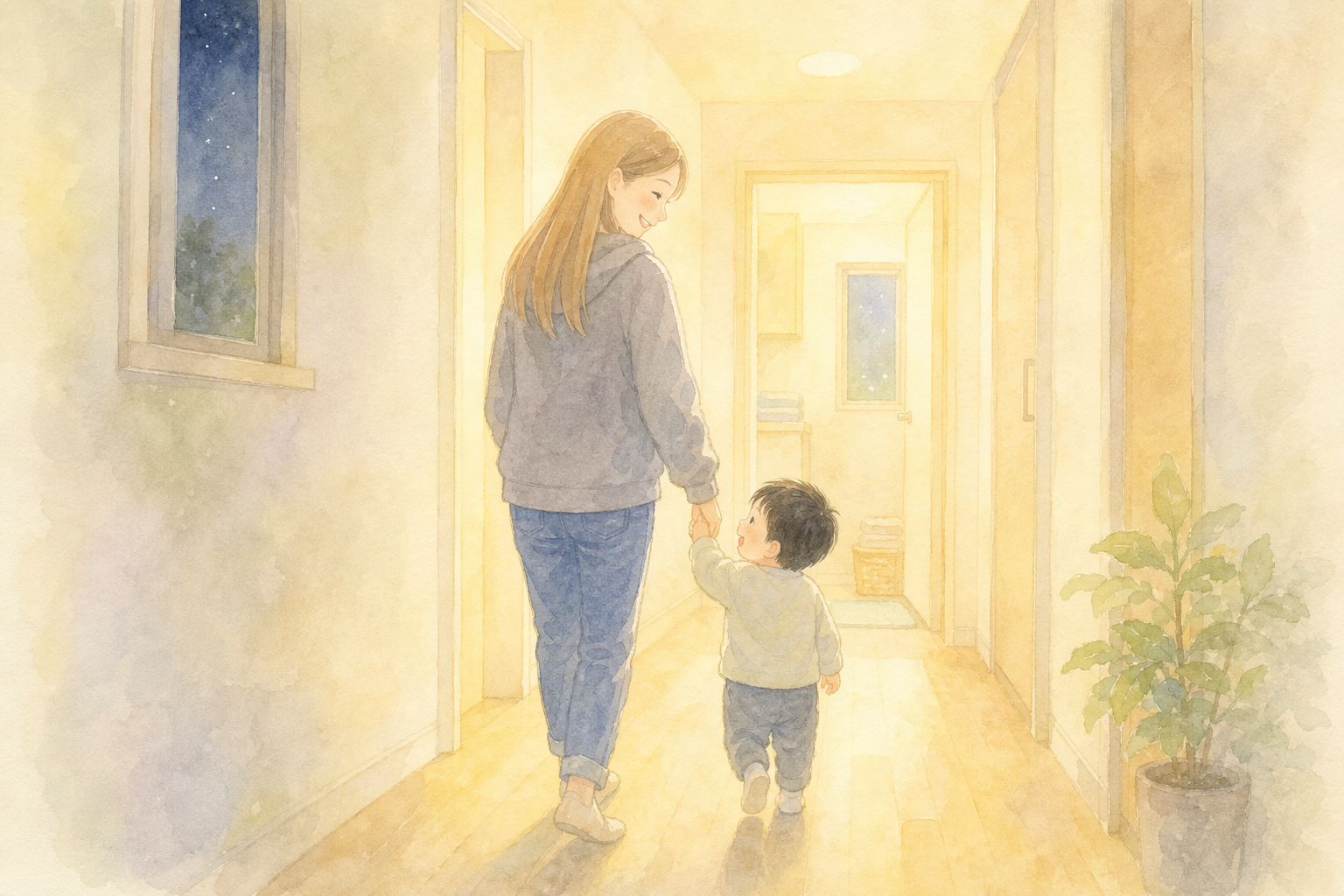夜の廊下を手をつないでお風呂へ向かう親子の後ろ姿
